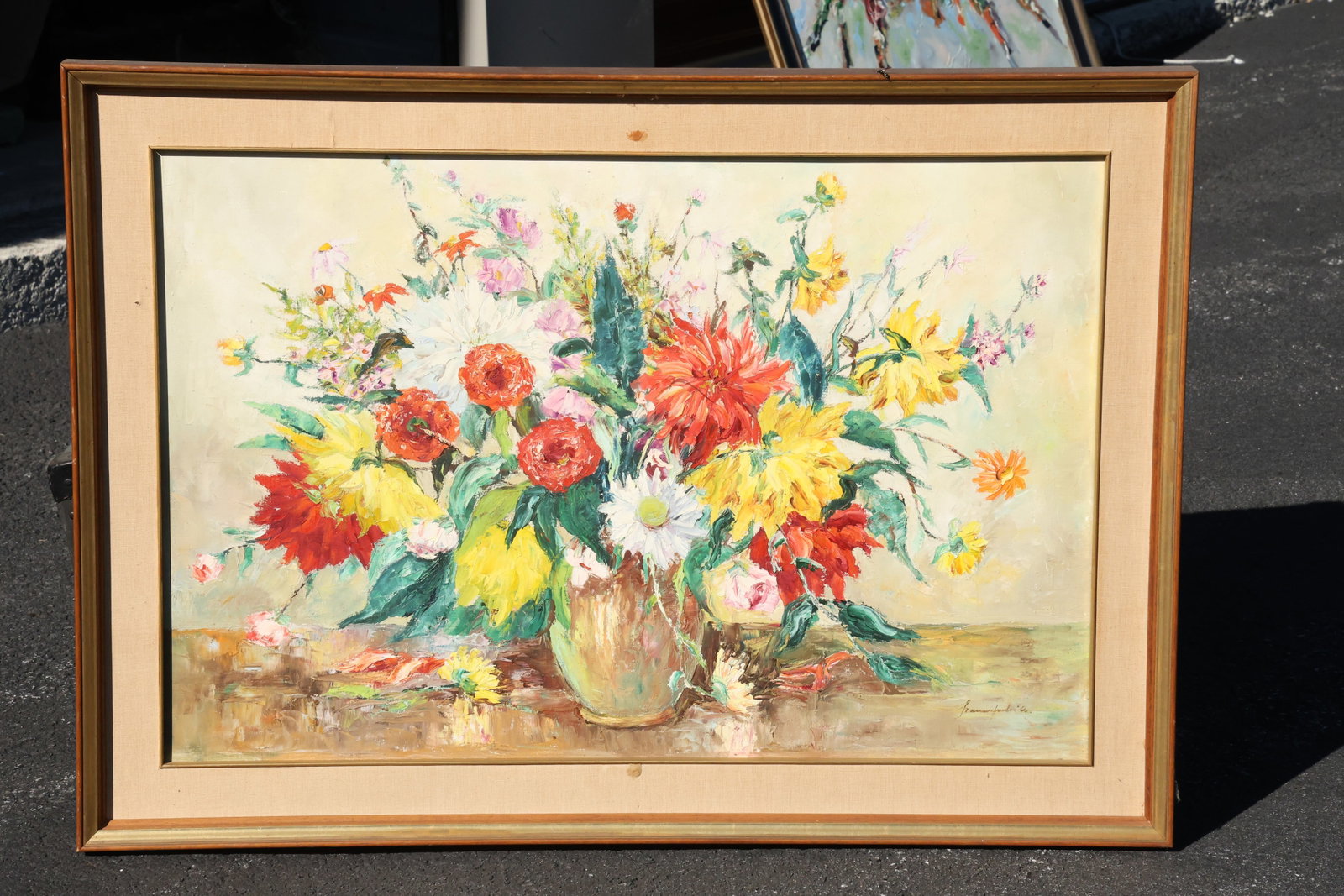 Signed Mixed Floral Bouquet Painting: A floral still life depicting a full vase of red, yellow, pink, and pale blossoms with green foliage. Loose brushwork and a warm, light background give the arrangement an airy appearance. Bears an ind