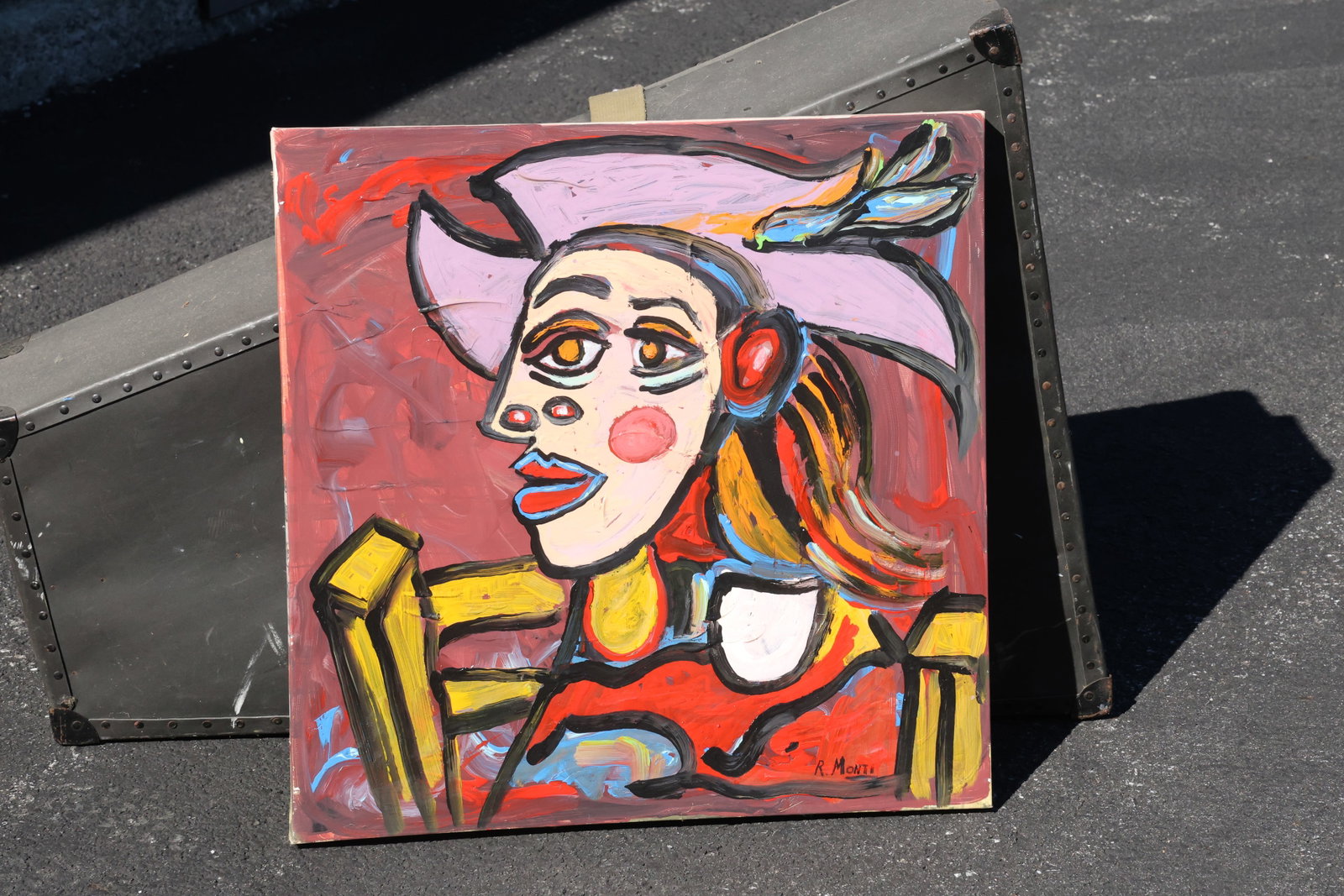 Rocco Monticolo (R. Monti) Woman in a Broad Pink Hat Painting: Painting by Rocco Monticolo (R. Monti). A stylized woman in a broad pink hat sits against a deep red ground. Large eyes, rosy cheeks, a red garment, and yellow chair details are defined by strong blac