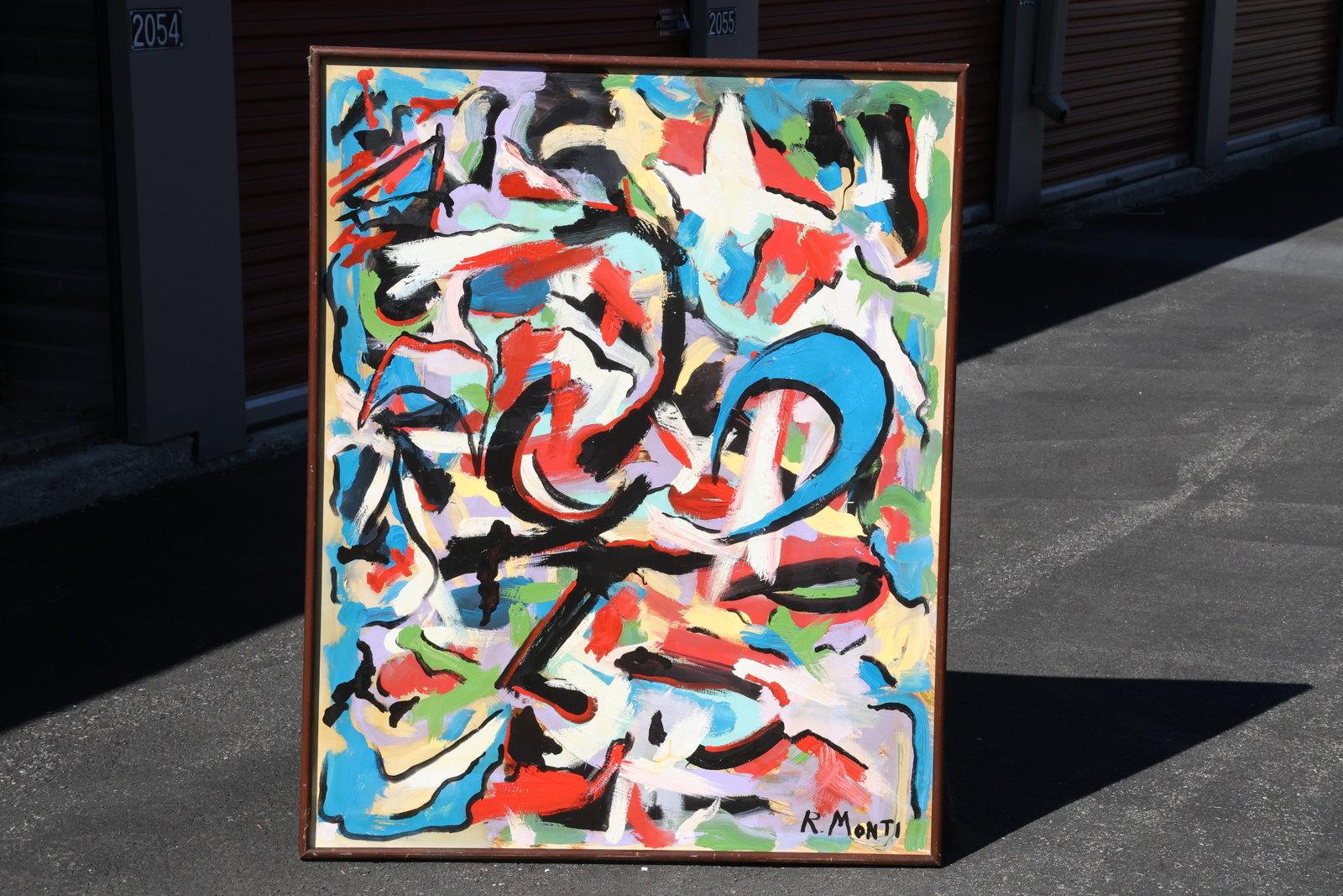 Rocco Monticolo (R. Monti) Large Flowing Color Abstraction Painting: Painting by Rocco Monticolo (R. Monti). Broad black and white curves interlock with red, blue, yellow, green, and pink passages. The large abstract surface is filled with looping, irregular forms and 