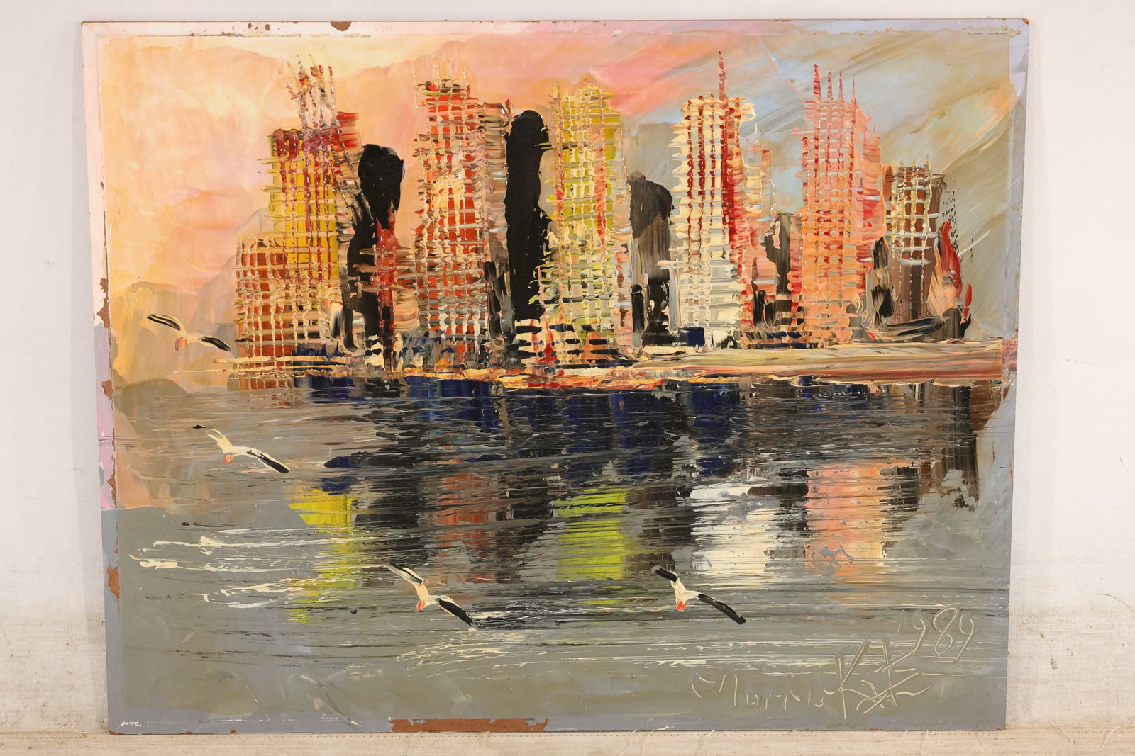 Morris Katz Waterfront Skyline Painting: Painting by Morris Katz depicting a dense waterfront skyline reflected in calm water. Tall buildings in warm orange, pink, and black rise above horizontal gray-blue reflections, with a bird flying low
