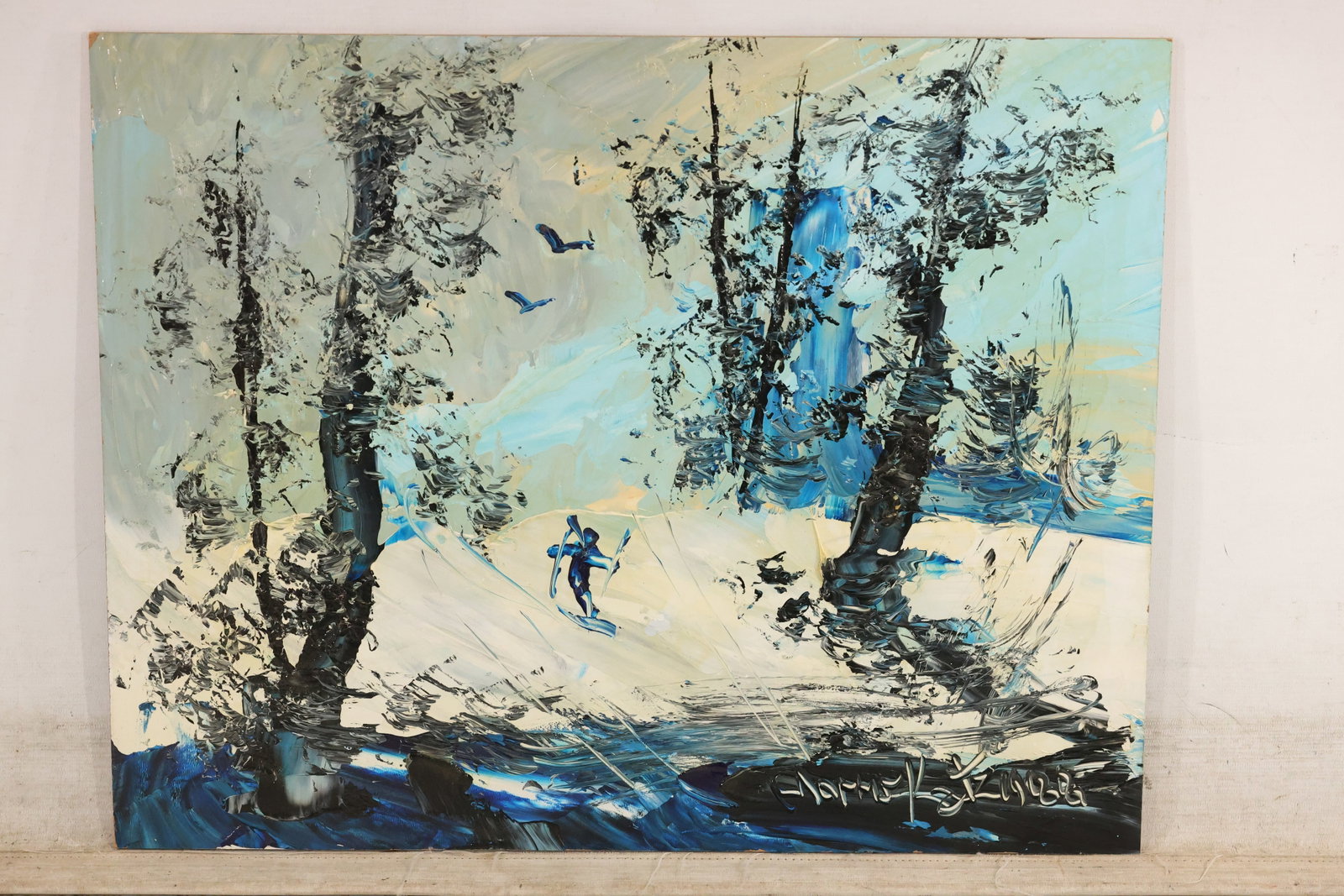 Morris Katz Blue Skier Winter Landscape Painting: Painting by Morris Katz depicting a blue-clad skier moving through snow between tall trees. A vivid blue sky and cool shadows contrast with thick white snow and dark trunks. Signed and dated 1988 at