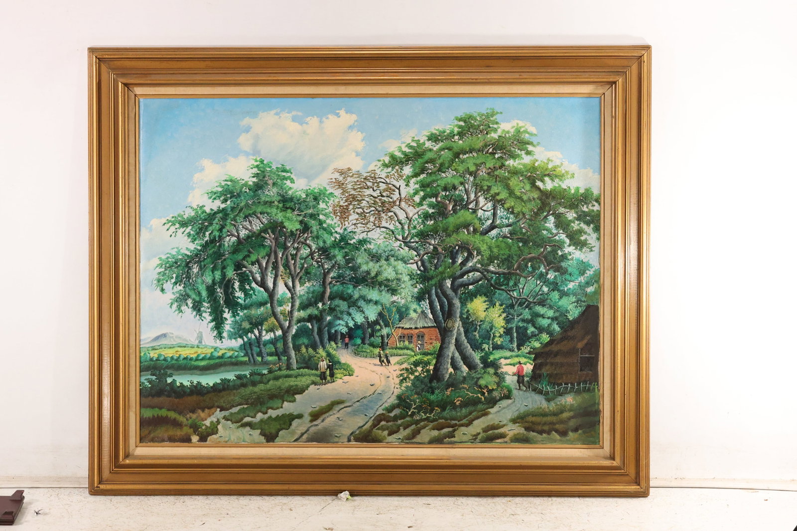 Gustav Gierke after Hobbema Landscape Painting, 1979: Oil painting on canvas depicting a tree-lined country road with small figures, rustic buildings, and water beyond. A handwritten inscription on the reverse reads "Hobbema - Landscape with Trees /