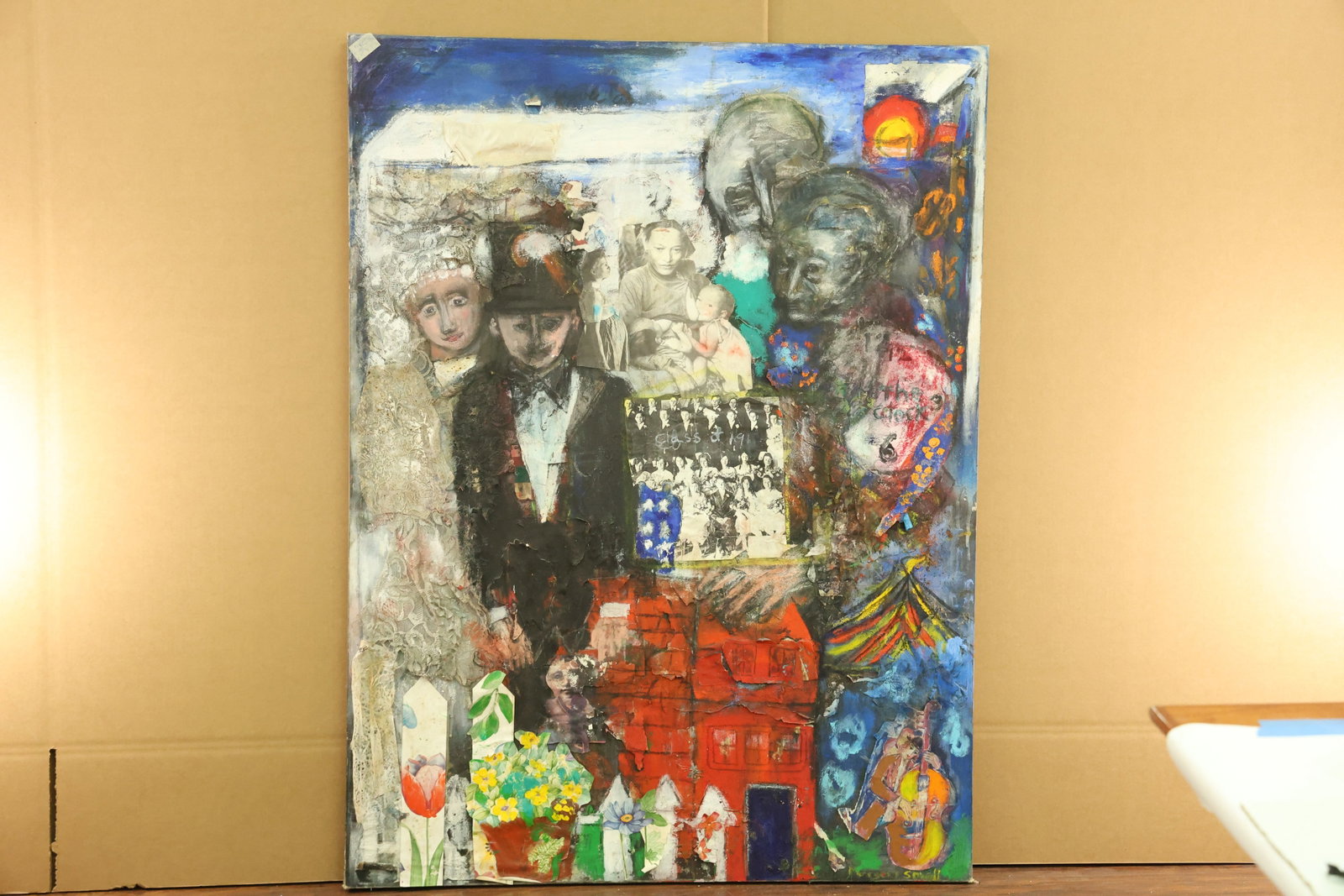 Signed Margery Small Figural Collage Painting: Vertical collage painting combining photographic faces, a formally dressed figure in a top hat, a group photograph, a red house, flowers and a stringed instrument. Painted strokes in blue, yellow, red