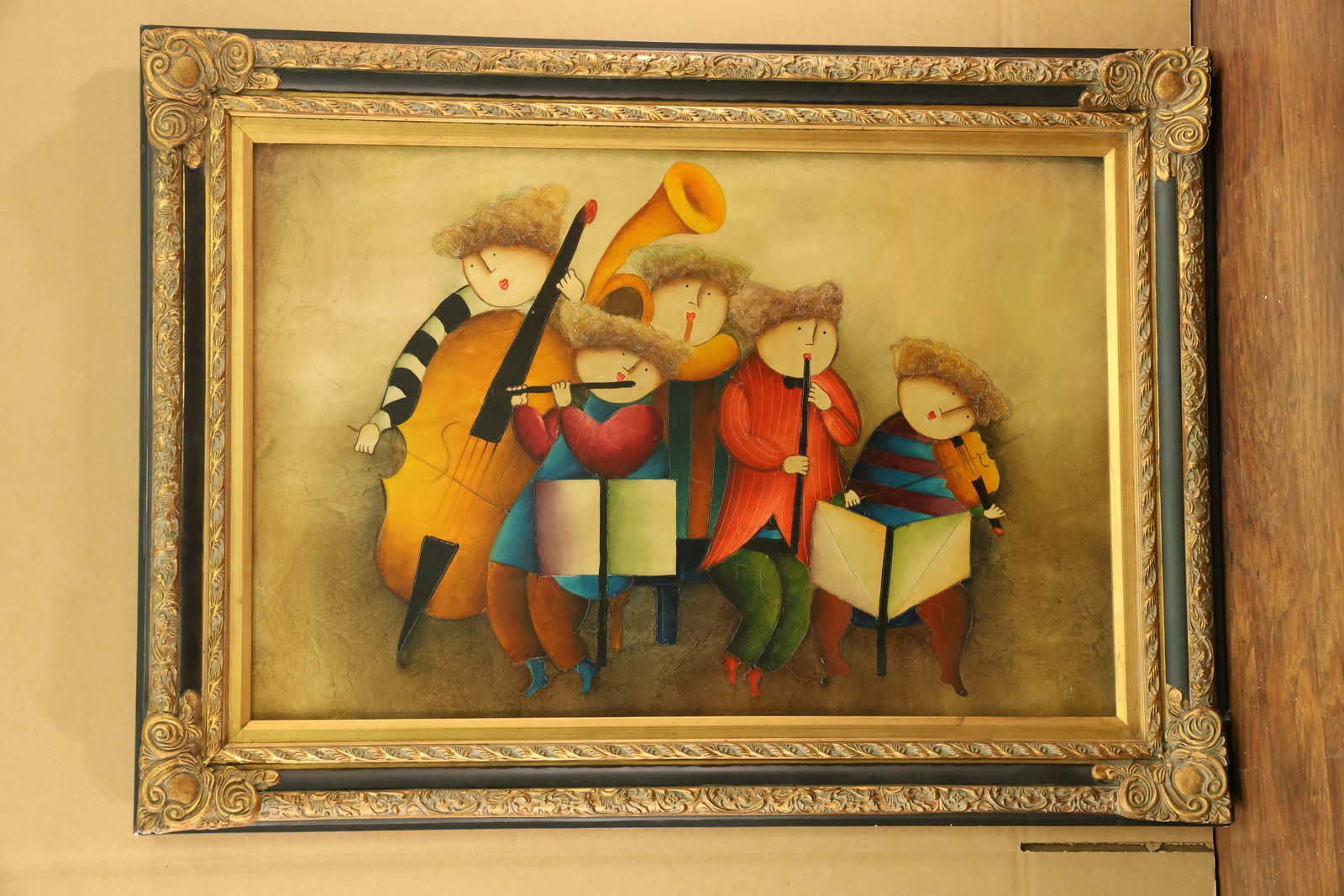 Five Musicians Painting in the Style of Joyce Roybal: Painting of five round faced musicians with curly textured hair, colorful clothing and music stands. The group includes bowed strings, a transverse flute, a vertical wind instrument and a large curved