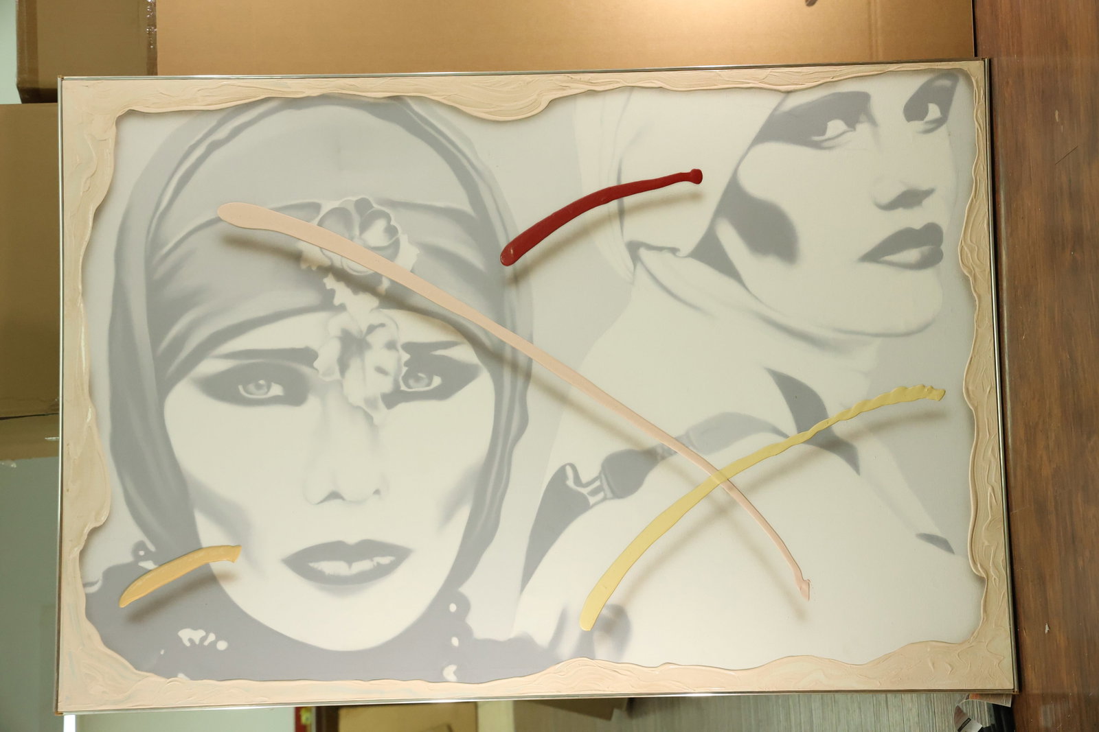 Large Female Portrait Composition in the Style of Jim Ceravolo: Large horizontal canvas composition showing two female faces in gray and white. Curving red, cream and yellow bands cross the portraits and cast or suggest shadows, while an irregular cream border sur