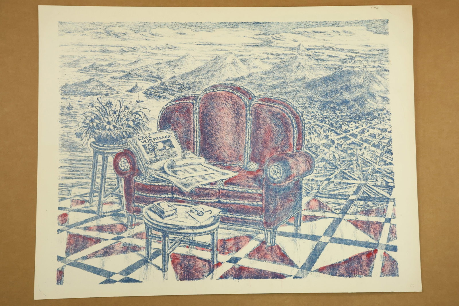 Red Armchair with Newspaper Color Print Attributed to Peter Passuntino: Color print on paper showing a red upholstered armchair with an open newspaper, small round table and potted flowers. A geometric tiled foreground meets a densely drawn distant landscape. Unsigned in 