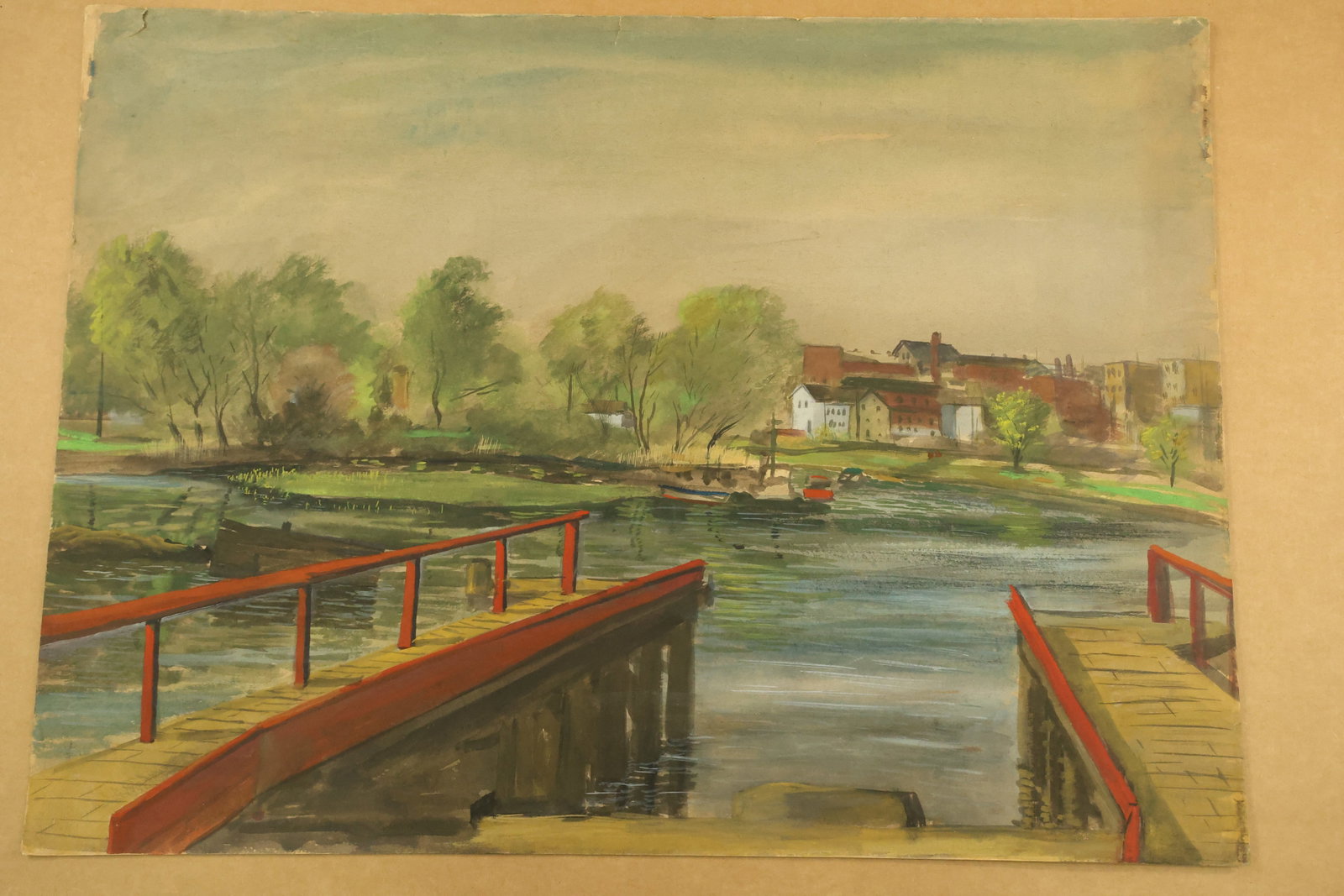 Red Railings and Waterfront Town Painting Attributed to Franklin Shores: Painting on paper showing red railings along two foreground waterfront platforms. Green blue water leads toward trees and clustered buildings beneath a muted sky. Broad opaque passages describe the st