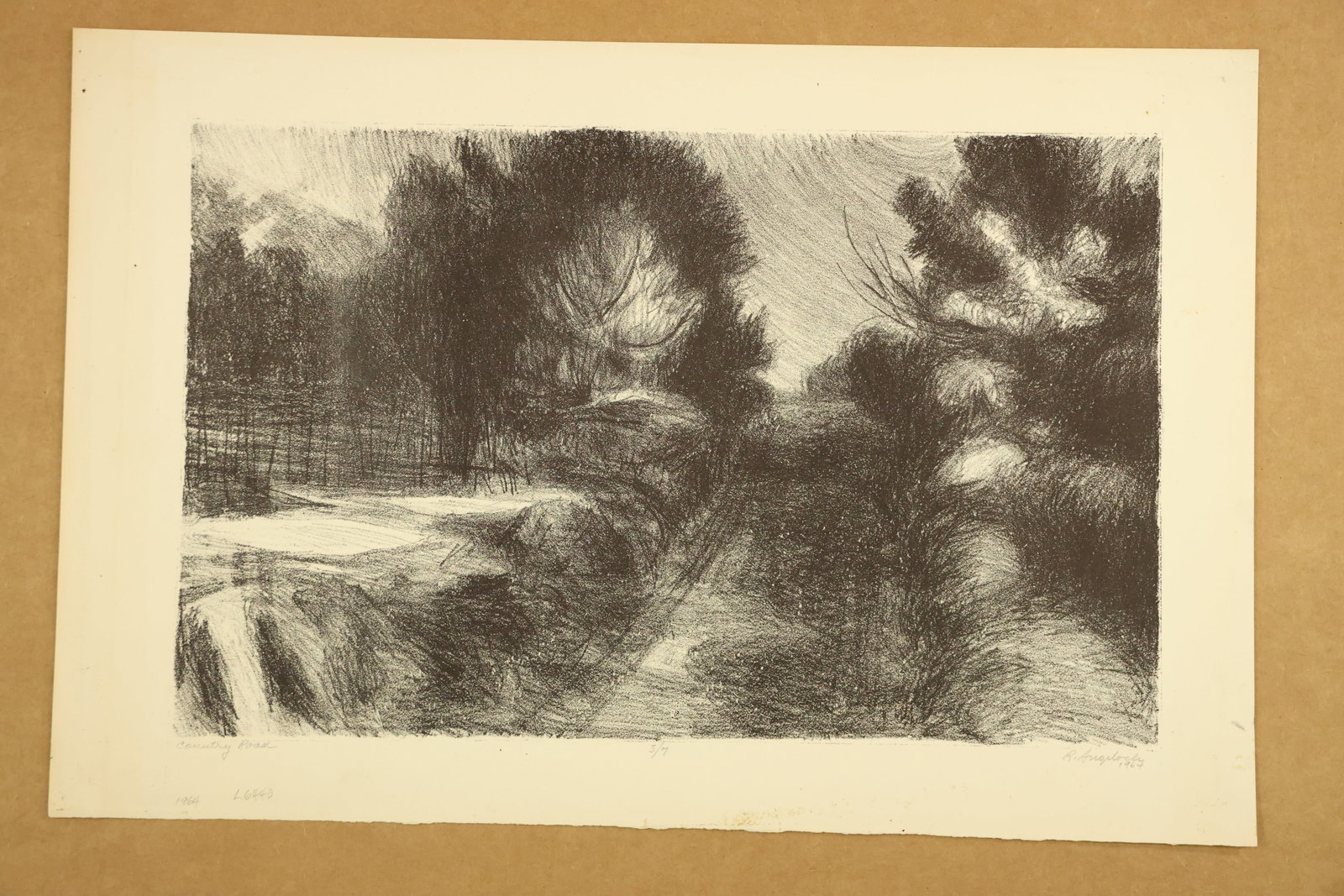 Country Road Landscape Print Signed R Angeloch 1964 Numbered 5/7: Monochrome landscape print on paper showing a curving road enclosed by dark trees and textured foliage. Pale areas of the path contrast with dense black and gray marks. Titled Country Road, signed R A