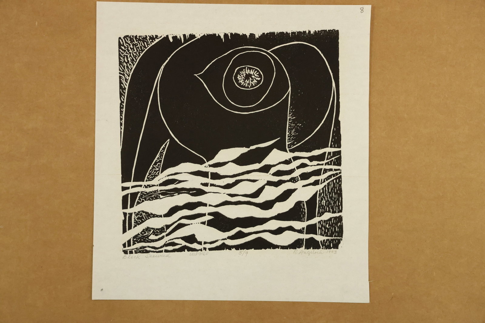 Black Seaweed Print Signed R Angeloch 1993 Numbered 5/9: Black and white print with a large eye shaped organic form above layered wavy bands and small linear textures. The lower margin is titled Black Seaweed, signed R Angeloch, dated 1993 and numbered 5/9.