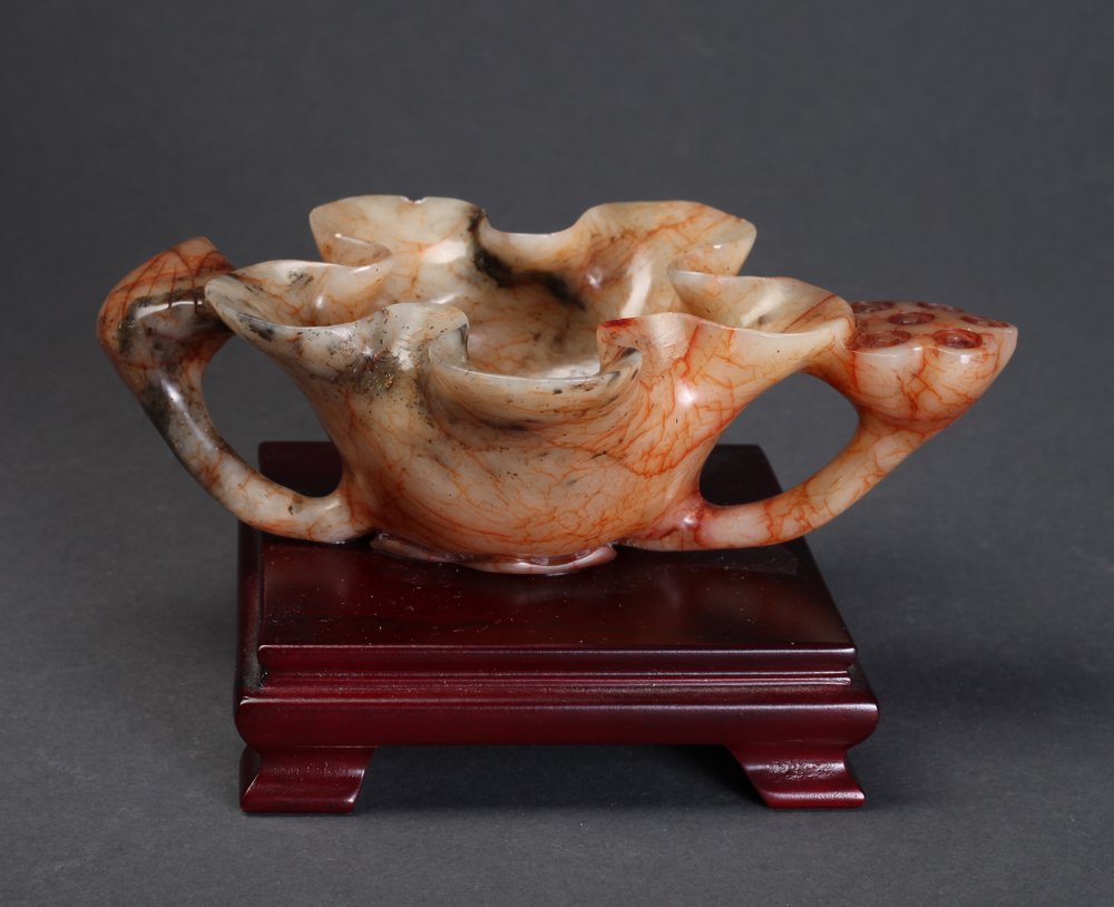 Chinese Carved Soapstone Dish on Stand: Finely carved to depict a lotus form bowl with pod handle. 2" H x 6.75" L. Small chip at rim.