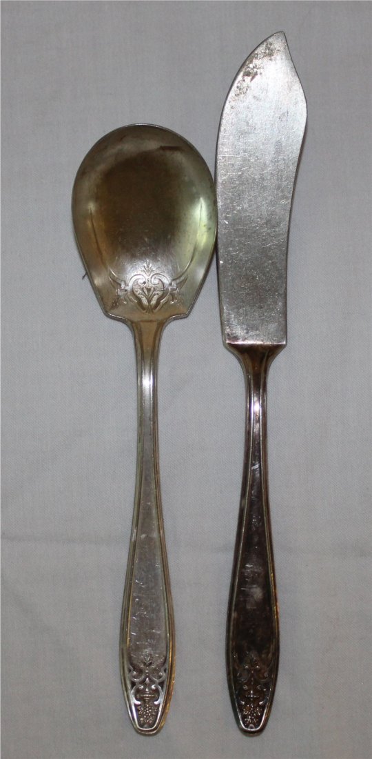 2 Antique Lady Doris Silver Plate: Includes a sugar spoon and a butter knife.