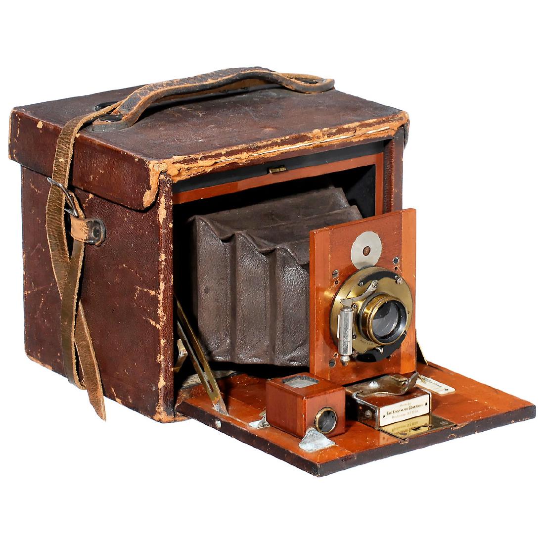 No. 4 Folding Kodak, c. 1890: No. 4 Folding Kodak, c. 1890 Eastman Kodak, Rochester, USA. Largest of rollfilm cameras of its era, body no. 177, unmarked brass lens by Bausch & Lomb. Camera for rollfilm and plates of 4 x 5 in. (3 c