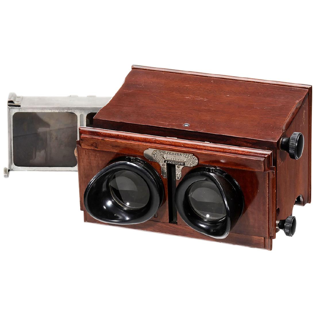 Planox Apescope 6 x 13, c. 1925: Planox Apescope 6 x 13, c. 1925 A. Plocq, Paris. Hand-held stereo viewer with magazine for 12 slides of 6 x 13 cm, focusing lenses and adjustable interocular distance. The slides are loaded into the f