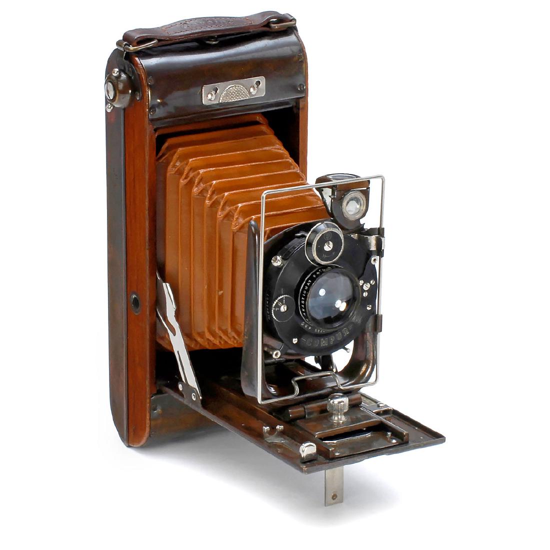 No. 12 Ensign Carbine "Tropical Model", c. 1926: No. 12 Ensign Carbine "Tropical Model", c. 1926 The Houghton-Butcher Mfg., London. Rollfilm camera 2 ½ x 4 ¼ in., combination of polished wood, "Florentine" bronzed copper and leather, brown leather