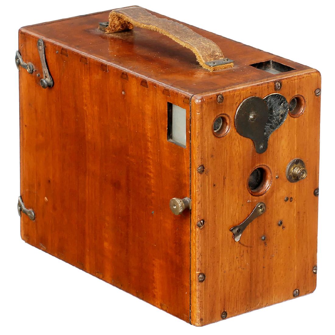 Polished Wood Magazine Camera 9 x 12, c. 1880: Polished Wood Magazine Camera 9 x 12, c. 1880 Unmarked, polished wood camera, gravity plate-changing system, cassettes inside, guillotine shutter with 4 shutter speeds (tension spring either loose or