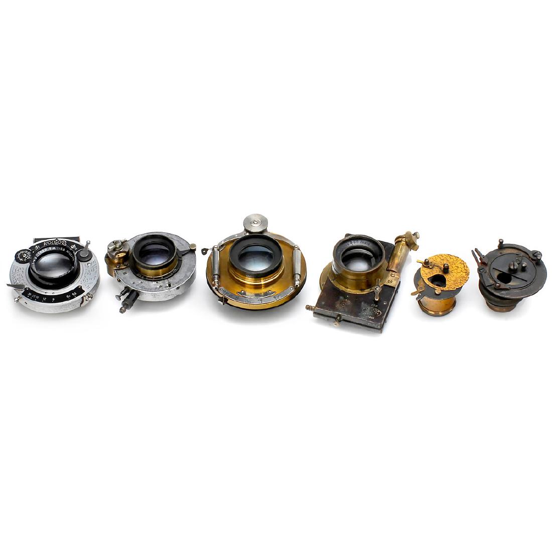 Lenses with Shutters: Lenses with Shutters 1) Voigtländer Collinear II 3, 1:5,4 in Voigtländer pneumatic shutter (working), No. 74116. iris stop (rare version). Shutter Ø approx. 3 in. With connecting ring. – 2) Voig