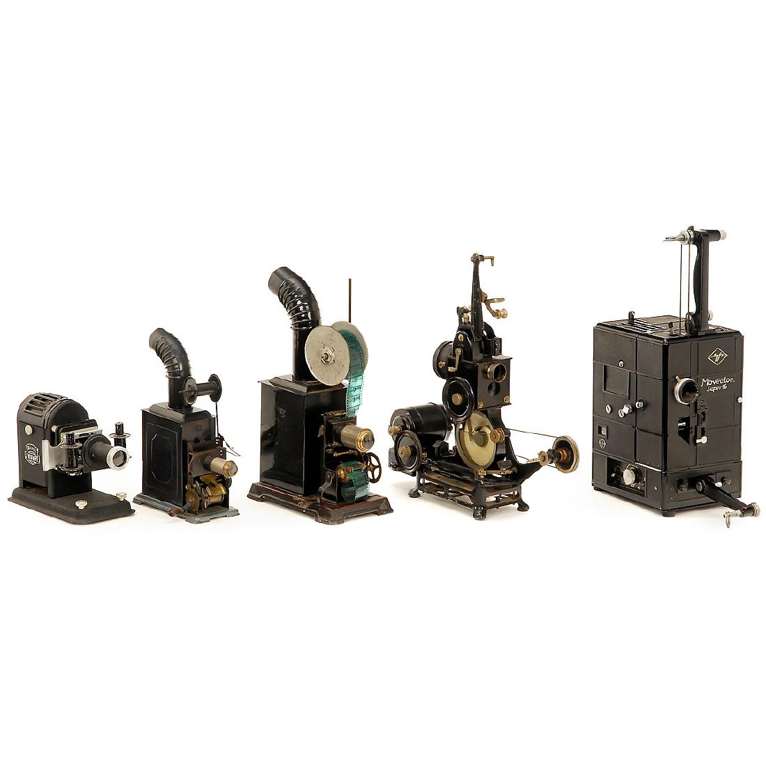 Lot of Movie Projectors: Lot of Movie Projectors 1) Toy cinematograph, Bing Werke, c. 1915, complete with chimney and film spool. – 2) Toy cinematograph marked "J.F.", complete with chimney and petroleum burner, c. 1915. �