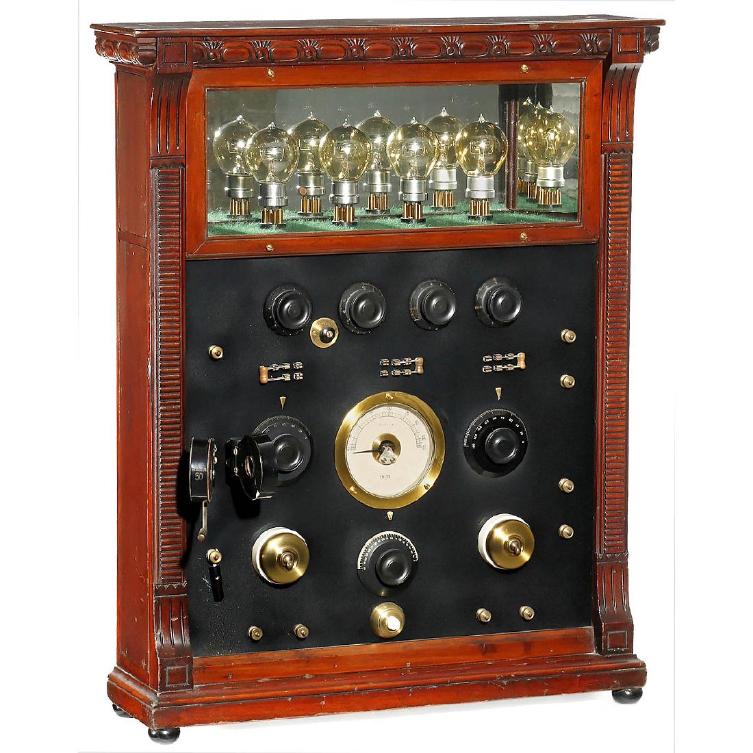 Demonstration Model Audion Radio Receiver: Demonstration Model Audion Radio Receiver Dated 1937, large mahogany case (22 x 6 x 28 3/4 in.), ebonite front, 1 swivel coil, 1 plug-in coil, 1 push button, 5 switches, large voltmeter, 7 adjustment