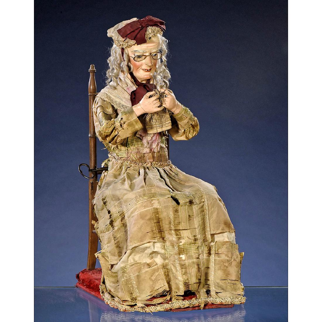 Vielle Tricoteuse Musical Automaton by Roullet et: "Vielle Tricoteuse" Musical Automaton by Roullet et Decamps, c. 1900 Depicting an elderly lady with papier-mâché character head, original paint, defined chin and cheekbones, carved teeth, tongue, ar