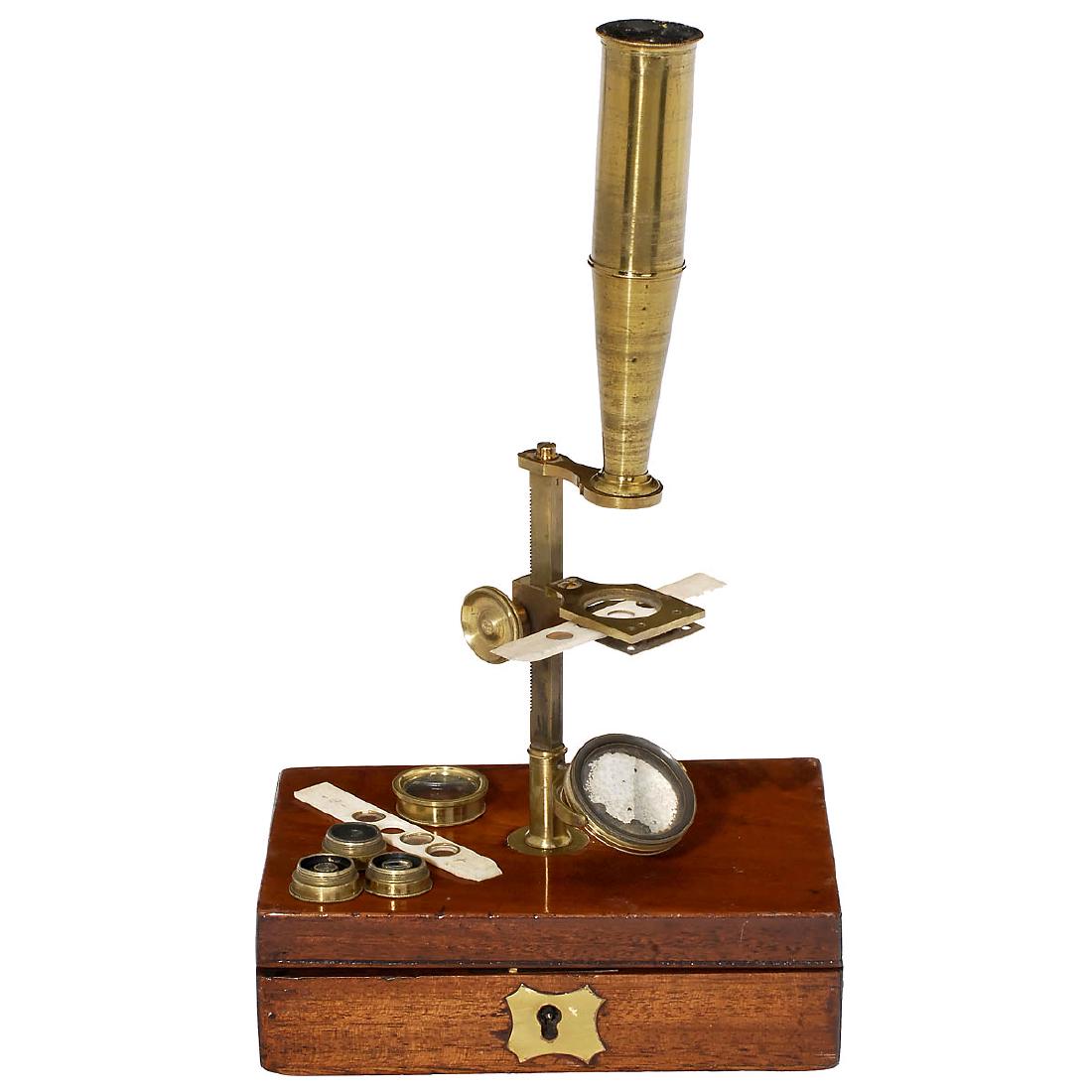 English Cary-Type Compound Microscope, c. 1850: English Cary-Type Compound Microscope, c. 1850 Box base, original lacquered brass, in mahogany case with 2 bone slides and further accessories, overall height 11 in. Englisches Reisemikroskop, um 1850