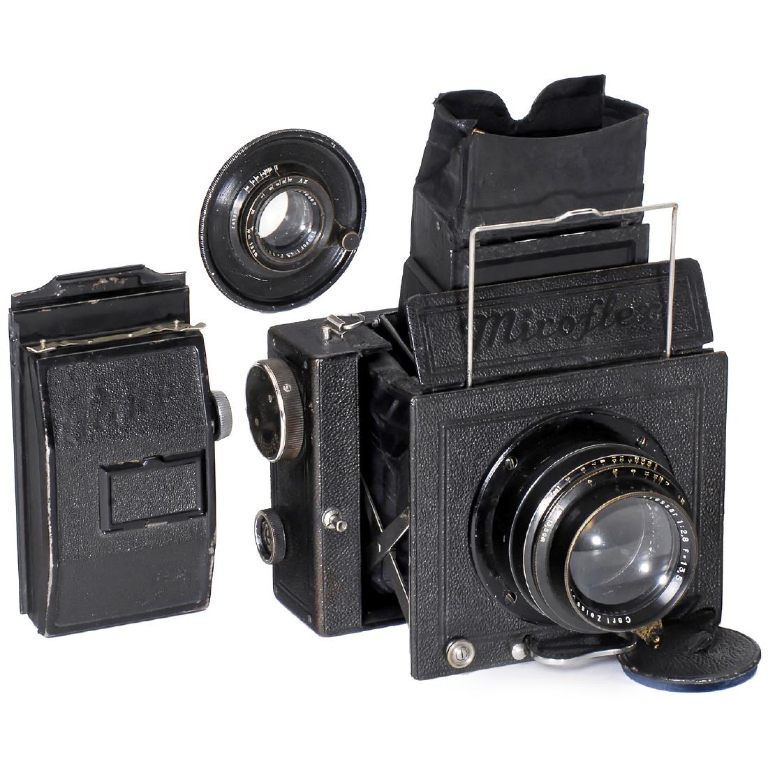 Zeiss Miroflex A (859/3), c. 1929: Zeiss Miroflex A (859/3), c. 1929 Zeiss Ikon. SLR camera 6,5 x 9 cm, no. P 39964, with rare Biotessar 2,8/13,5 cm, no. 889216 and Tessar 4,5/12 cm, no. 376467, shutter working (at one speed). - In add