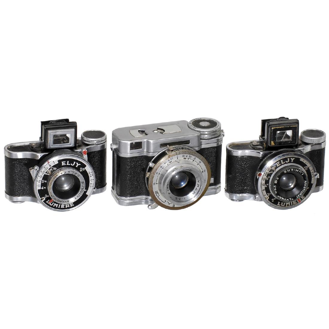 3 Eljy Cameras: 3 Eljy Cameras Lumière, France. 1) Eljy Club, 1951, size 24 x 36 mm on special rollfilm, Lypar 3,5/40 mm, shutter 1-1/300 sec. (3-/3+) - 2) Eljy (1945), Anastigmat Lypar 3,5, shutter 1/10-1/150 s