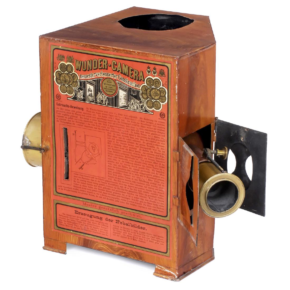 Wunder-Camera by Mittelstrass, c. 1890: "Wunder-Camera" by Mittelstrass, c. 1890 Gebr. Mittelstrass, Magdeburg. Large version, height 14 1/5 in., double function (magic lantern and projector for opaque prints), with one lens (second lens mi