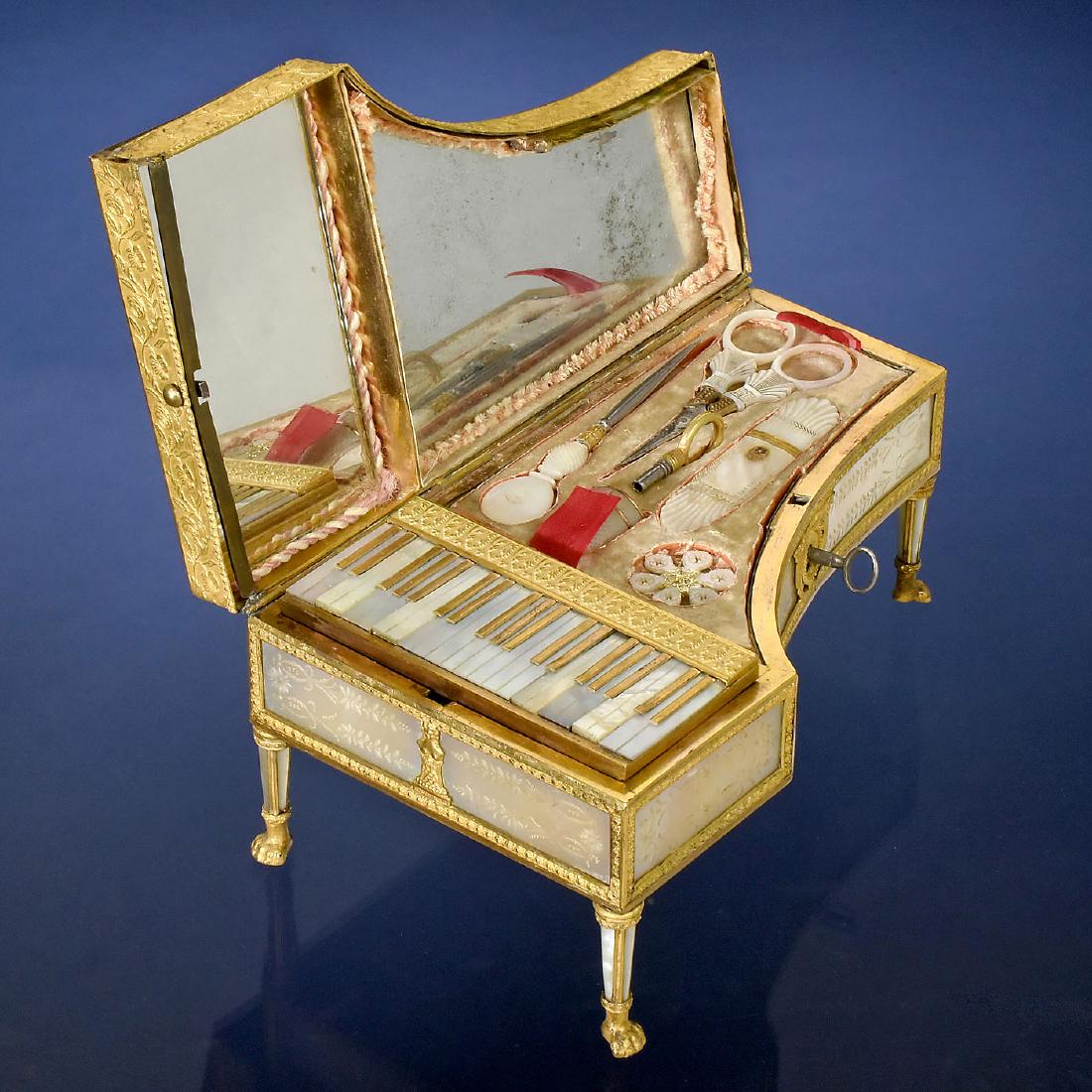 Fine Palais Royale Musical Piano-Form Sewing: Fine Palais Royale Musical Piano-Form Sewing Necessaire, c. 1830 With two-air musical movement no. 2917, sectional comb with sixteen groups of four and one group of five teeth (complete), fitted tray