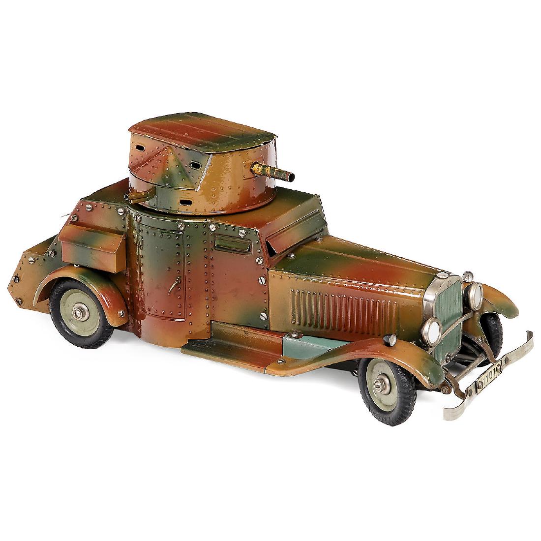 Märklin Armored Car No. 1108G, c. 1935: Märklin Armored Car No. 1108G, c. 1935 Gebrüder Märklin & Cie., Göppingen, Germany. Construction-kit car, handpainted camouflage tin, spring-driven (working), cap-firing gun under 