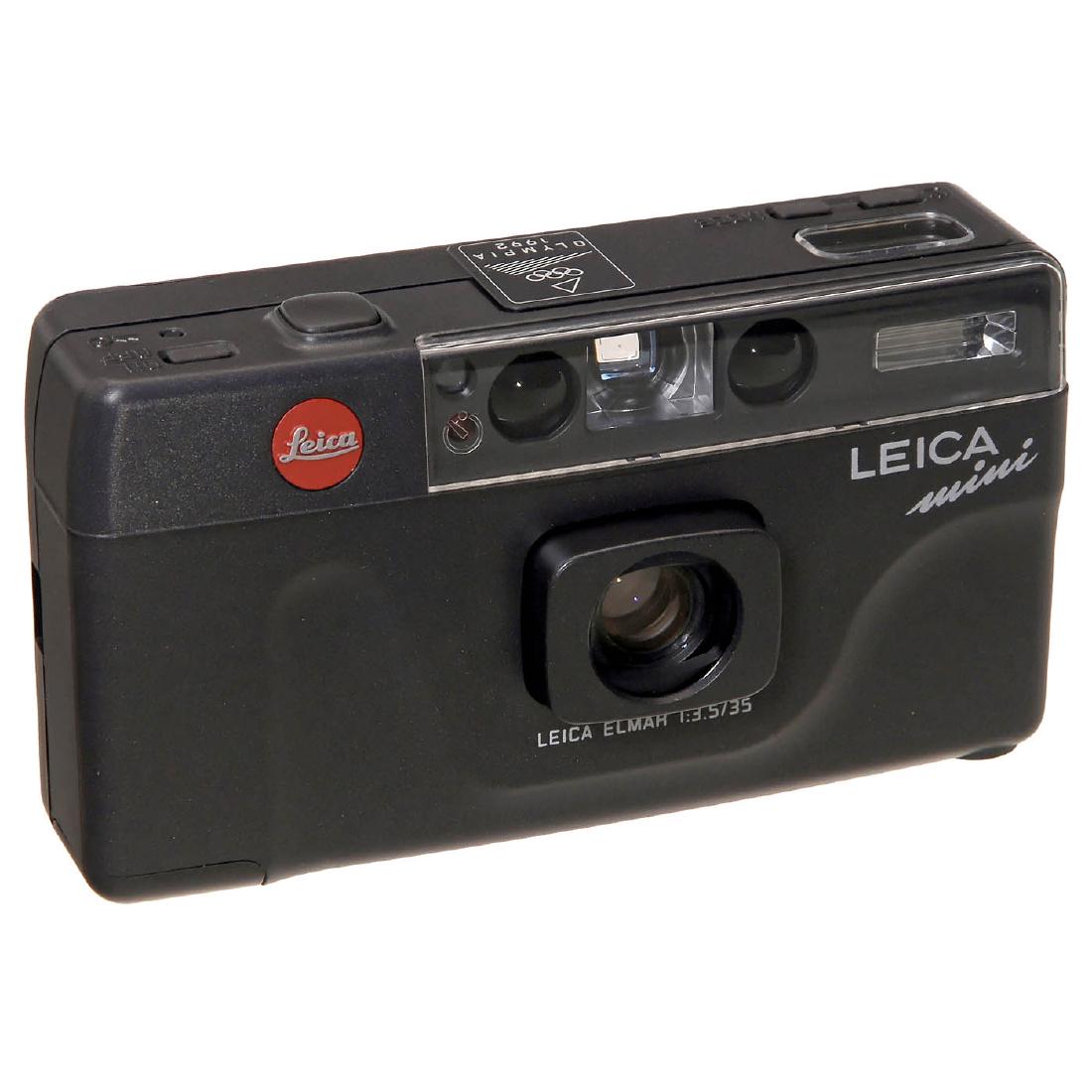 Leica mini "Olympia 1992" Special Edition: Leica mini "Olympia 1992" Special Edition Leica, Solms. No. 1846511, with Leica Elmar 3,5/35 mm, case. Leica mini "Olympia 1992" Special Edition Leica, Solms. Nr. 1846511, mit Leica Elmar 3,5/35 mm, T