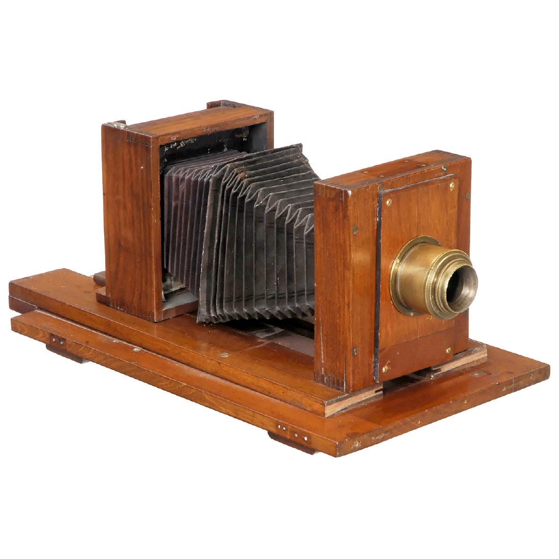 Recording Camera 6 x 9 cm, c. 1900: Recording Camera 6 x 9 cm, c. 1900 Unmarked, polished wood, black bellows, camera on wooden board, unmarked brass lens with iris stop, focusing screen back. Size of the camera (l/b/h) 16 ½ x 9 x 7 ½