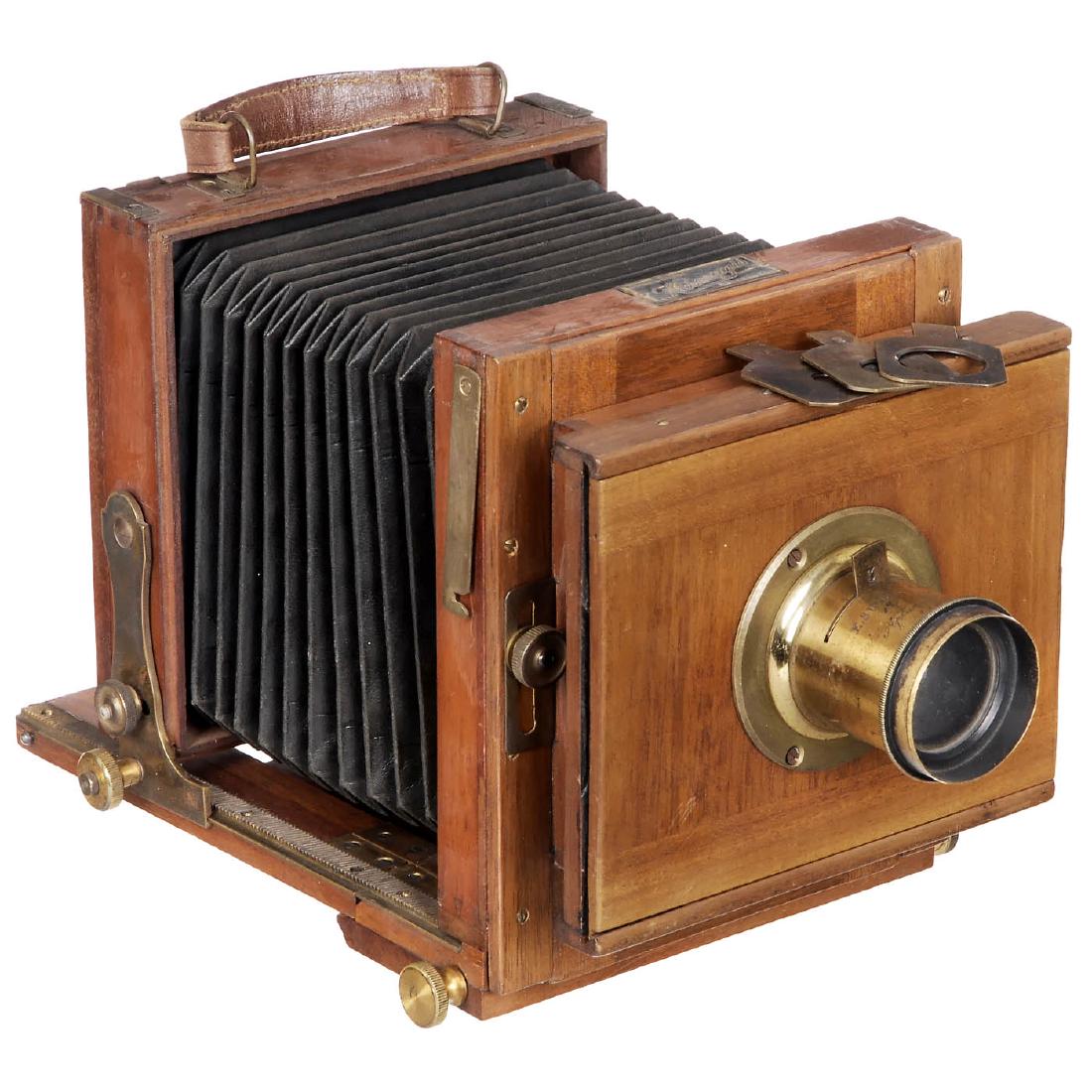 Small Field Camera by Hermagis, c. 1880: Small Field Camera by Hermagis, c. 1880 Hermagis, Objectifs et Appareils, 29 Rue du Louvre, Paris. Size 3 ½ x 4 ¾ in. (9 x 12 cm), polished wood with brass fittings, black square bellows, focusing s