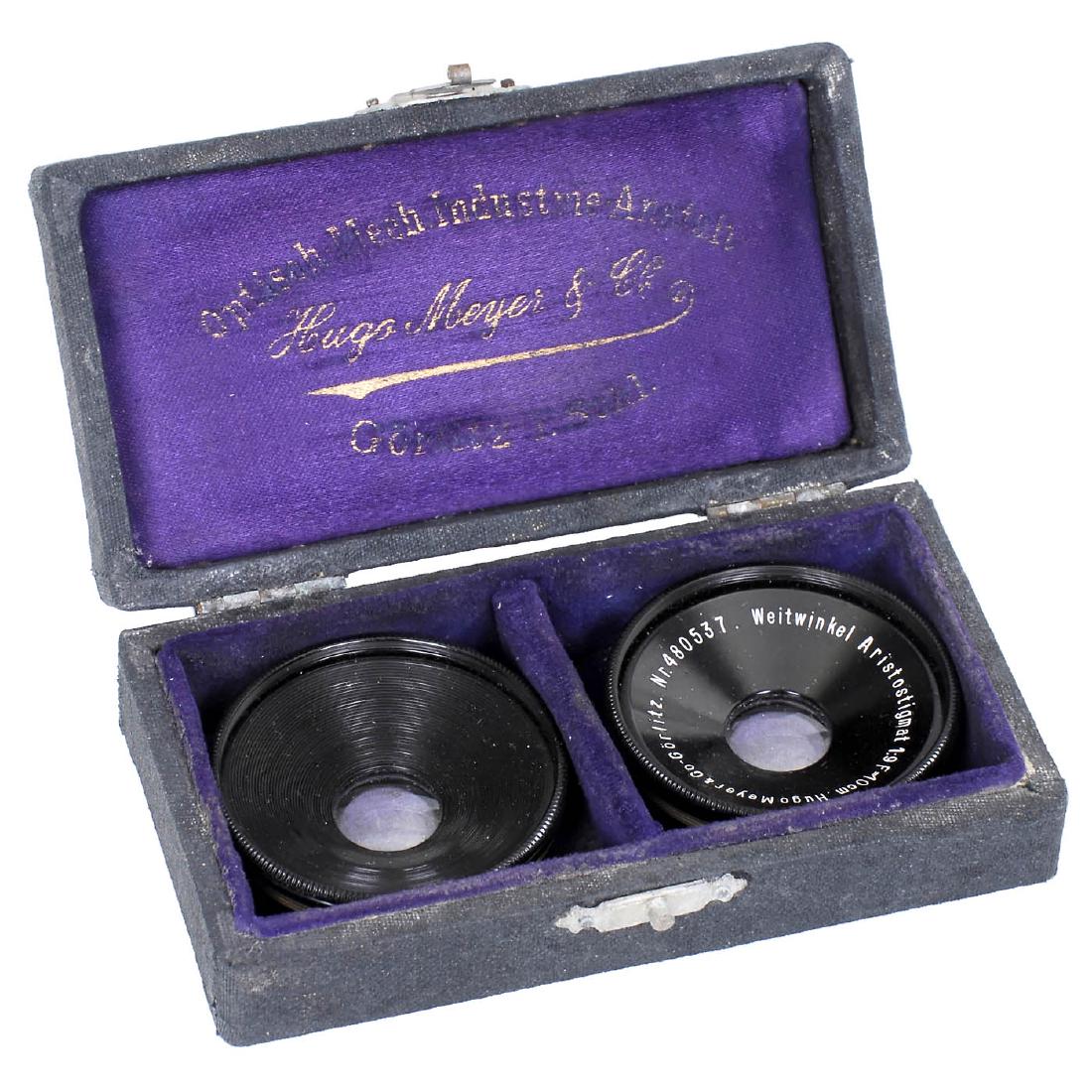 "Weitwinkel Aristostigmat 9/10 cm", c. 1910: "Weitwinkel Aristostigmat 9/10 cm", c. 1910 Hugo Meyer, Görlitz. No. 480537, front and rear element, in original case. Weitwinkel Aristostigmat 9/10 cm, um 1910 Hugo Meyer, Görlitz. Nr. 480537, Vord