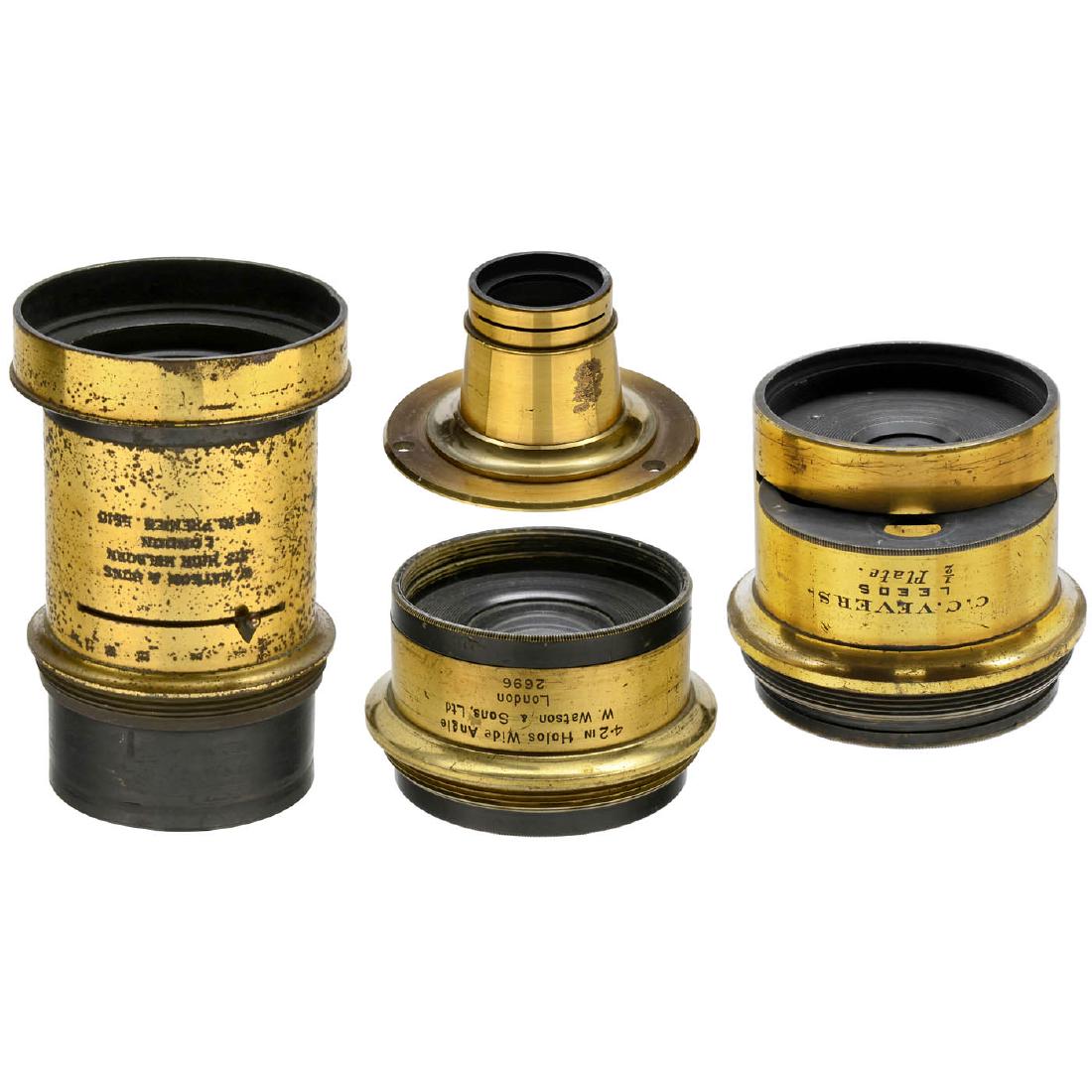 4 Brass Lenses from England: 4 Brass Lenses from England 1) Watson & Sons. "12 x 10 Premier", c. 1875, no. 5510, probably an aplanatic lens, iris stop (stuck), approx. 45 cm focal length, height approx. 6 in., lens diameter appro