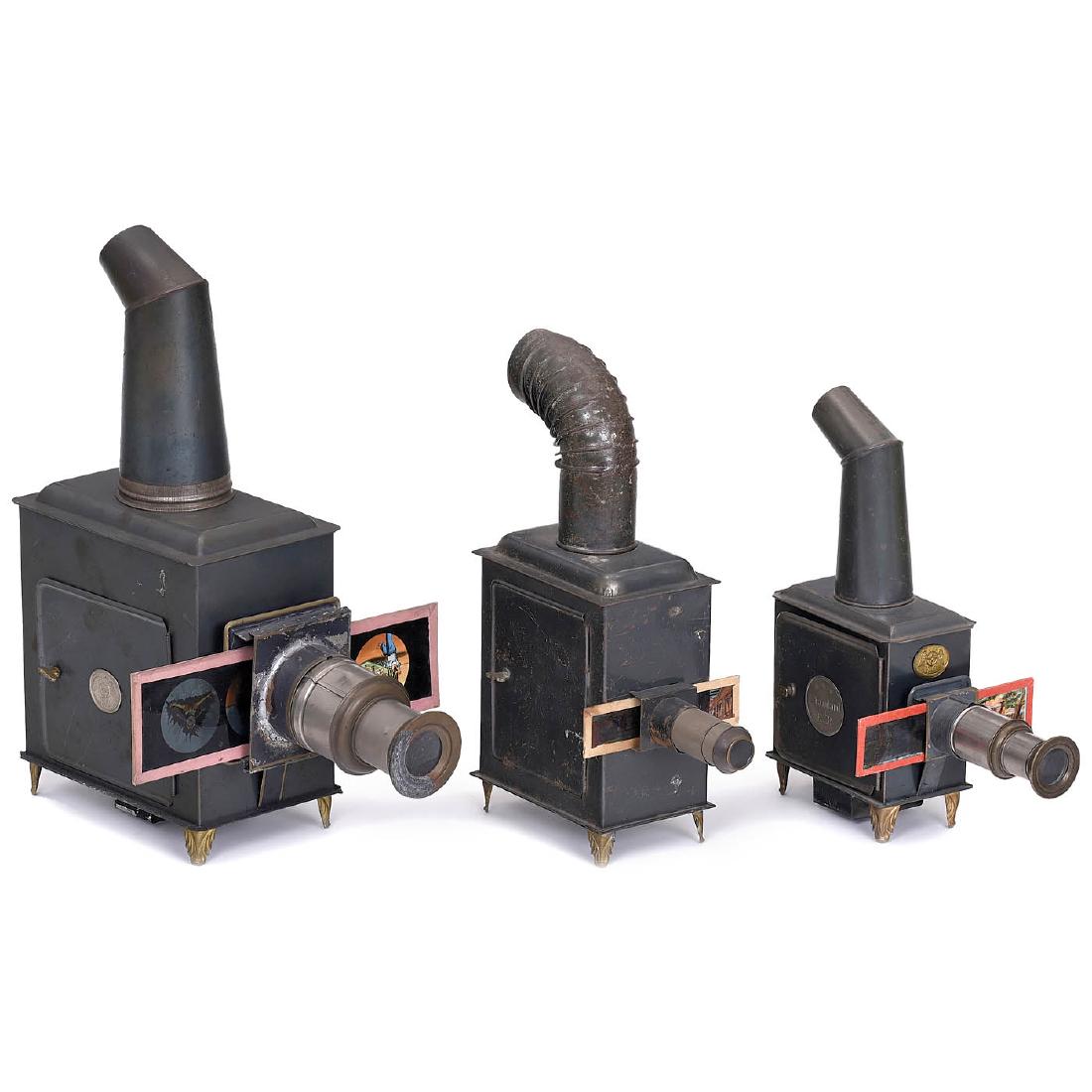 3 Magic Lanterns by E. Plank, c. 1900: 3 Magic Lanterns by E. Plank, c. 1900 Ernst Plank, Nürnberg. 1) "Standard", for slides with height of 1 2/5 in., height of the lantern 10 5/8 in. - 2) Unmarked Plank lantern, for slides with height o