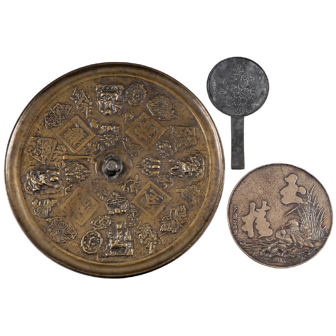 3 Magic Mirrors, c. 1900: 3 Magic Mirrors, c. 1900 Japan. Metal mirrors, diameter 13 ¾ in., 6 ¾ in. and 4 in. (with grip). With Japanese characters and symbols. - Significant optical-illusions collector's items. 3 Magic Mirr