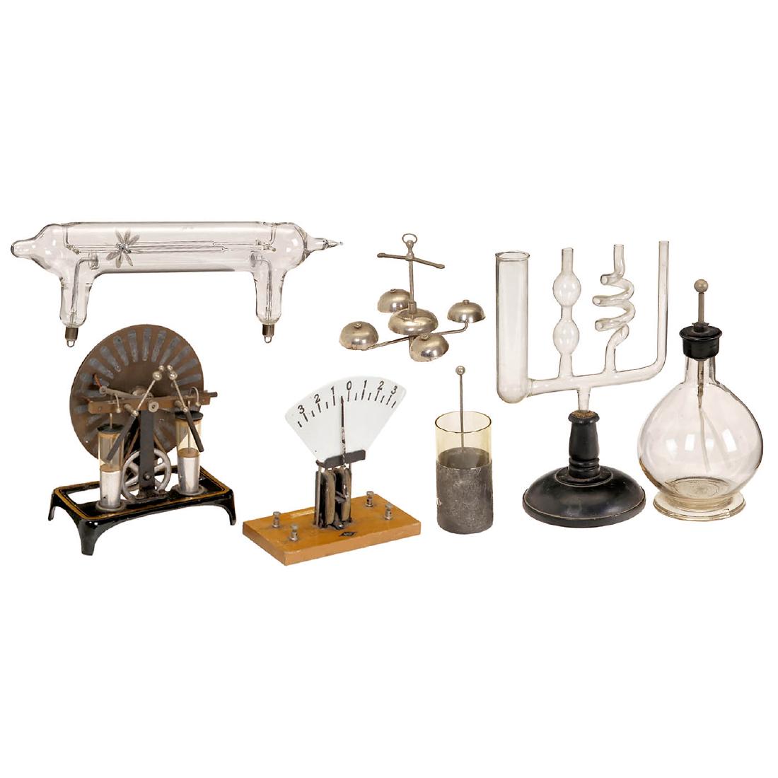 Physical Demonstration Models, c. 1920: Physical Demonstration Models, c. 1920 1) Small Wimshurst's induction machine, complete but for restoration. - 2) Communication tubes. - 3) Electroscope. - 4) Vertical galvanometer. - 5) Leyden jar. -
