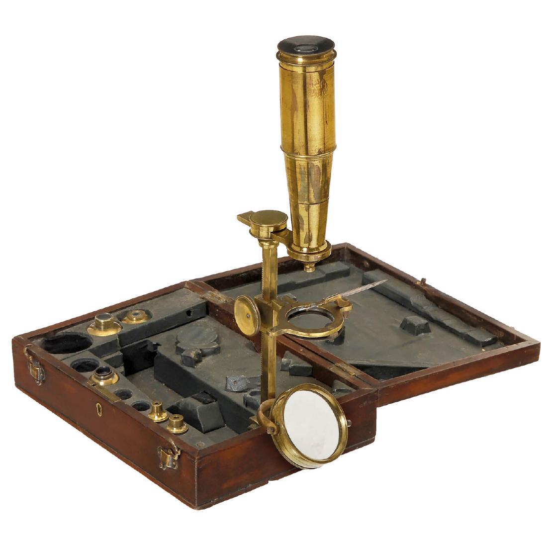 Robert Huntley Compound Traveling Microscope, c. 1830: Robert Huntley Compound Traveling Microscope, c. 1830 Signed on the stage: "Huntley, No. 52, High Holborn, London". Lacquered brass, mahogany box base with brass bracket supporting the microscope, dou