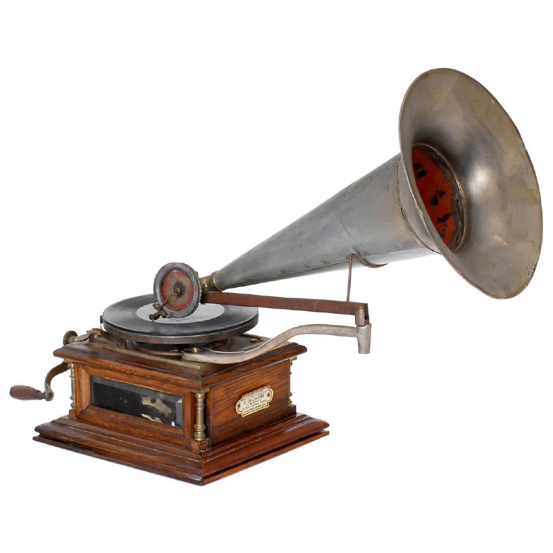 Zonophone Style A Gramophone, c. 1900: Zonophone Style A Gramophone, c. 1900 No. 456, bedplate inscribed in English and Russian, 7 in. turntable, zinc-horn on metal bracket with wood tone arm, oak case, 4 corner columns, 2 beveled glass
