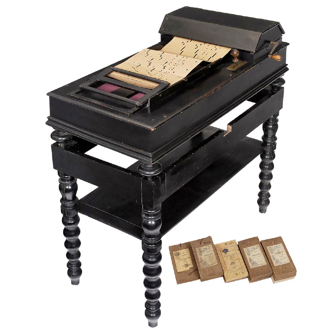 48-Note Piano Melodico on Stand, c. 1900: 48-Note Piano Melodico on Stand, c. 1900 No. 1547, manufactured by "Giovanni Racca", Bologna, Italy, for folding cardboard books, hand-cranked, steel-strings, expression lever, metal frame, black poli