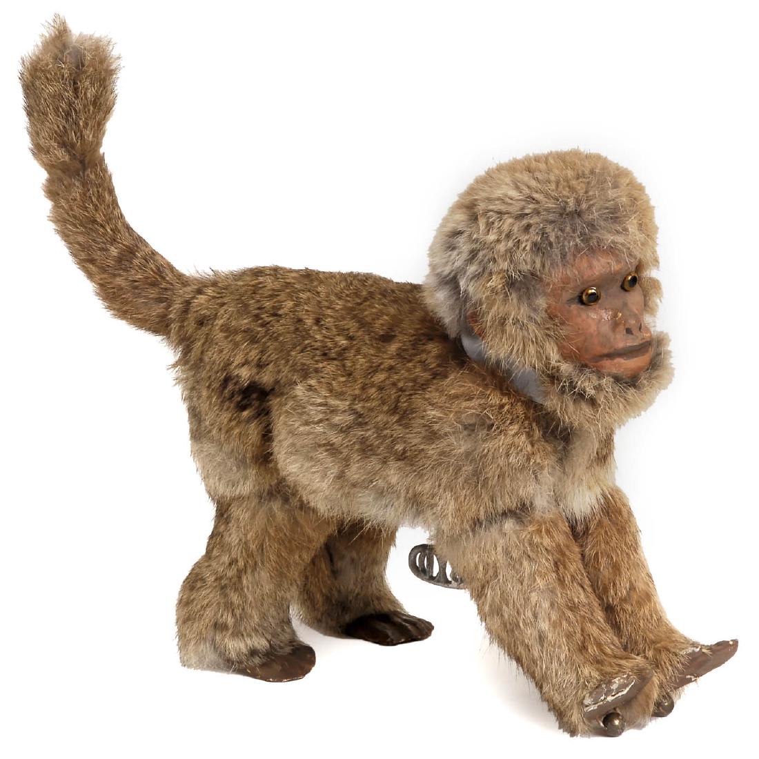 Running Monkey Automaton by Decamps, c. 1930: Running Monkey Automaton by Decamps, c. 1930 Fur-covered papier-mâché animal with amber glass eyes, articulated legs, brass rollers under his forefeet, "RD" key and open-spring mechanism in the body