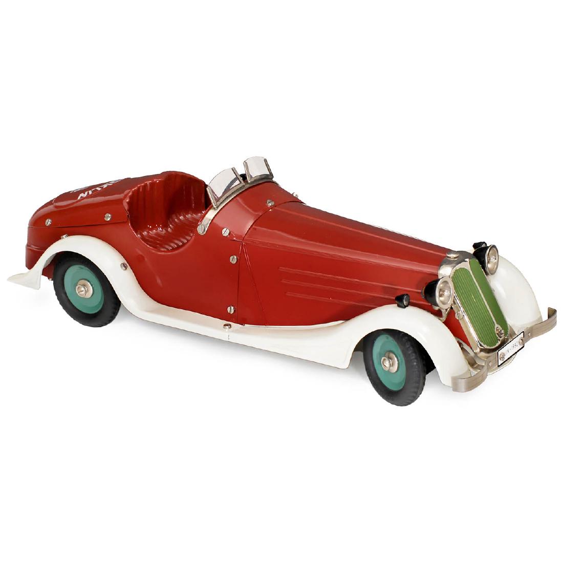 Märklin Sporting Car IIIX, c. 1992: Märklin Sporting Car IIIX, c. 1992 Special edition by Gebrüder Märklin & Cie., Göppingen, and Mr. Schmidt, Altenburg. Construction kit car, hand-painted tin, spring-driven (working), length 14 ½