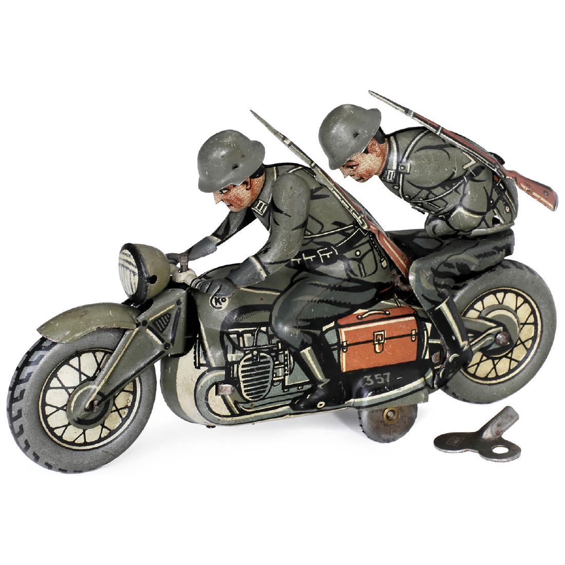 Kellermann Military Motorbike with Pillion No. 357, c.: Kellermann Military Motorbike with Pillion No. 357, c. 1935 Georg Kellermann & Co, Nuremberg, Germany. Pre-war model, lithographed tin, spring-driven (working), with articulated passenger and motor so