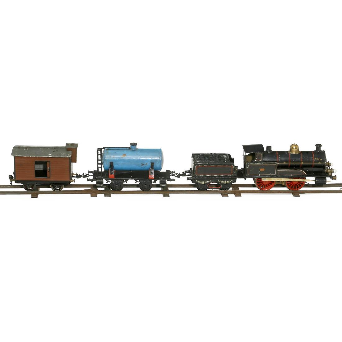 Märklin No. R 3131 Locomotive with Tender, Gauge I, c.: Märklin No. R 3131 Locomotive with Tender, Gauge I, c. 1914 Electric motor, 2 front lamps, coupling rod replaced, overall length 16 1/6 in. - In addition: Closed goods car with brakesman's cab, prob