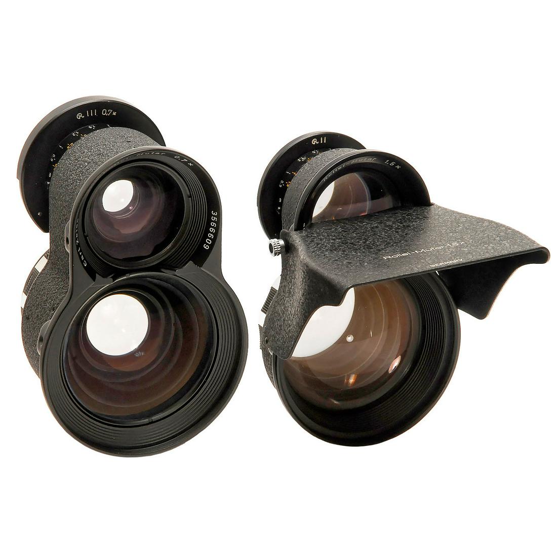 Rollei-Mutar 0,7x and 1,5x: Rollei-Mutar 0,7x and 1,5x Carl Zeiss/Franke & Heidecke. For Rollei TLR cameras. 1) Rollei-Mutar 0,7x, no. 3566609, bayonet III, with case. (2/2) - And: 2) Rollei-Mutar 1,5x, no. 3570152, bayonet II,