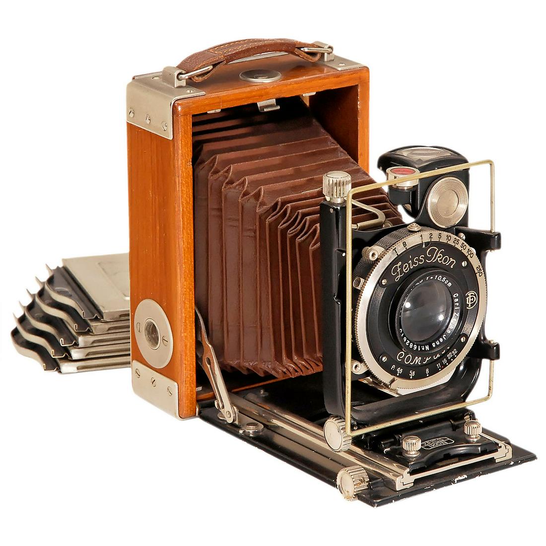 Tropen Adoro (230/3), 1927: Tropen Adoro (230/3), 1927 Zeiss Ikon, Dresden. No. Q 97239, size 6,5 x 9 cm, polished teak, Tessar 4,5/10,5 cm in rim-set Compur 1-1/250 sec., leather, bellows and focusing screen back in brown, with