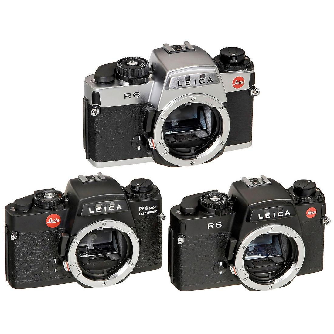 Leica R4 Mot, R5 and R6: Leica R4 Mot, R5 and R6 1) Leica R4 Mot Electronic, no. 1540846, body cap. (2-3/2) - 2) Leica R5, black, no. 1764284, body cap, excellent condition. (2/1) - And: 3) Leica R6, chrome, no. 1772297, body