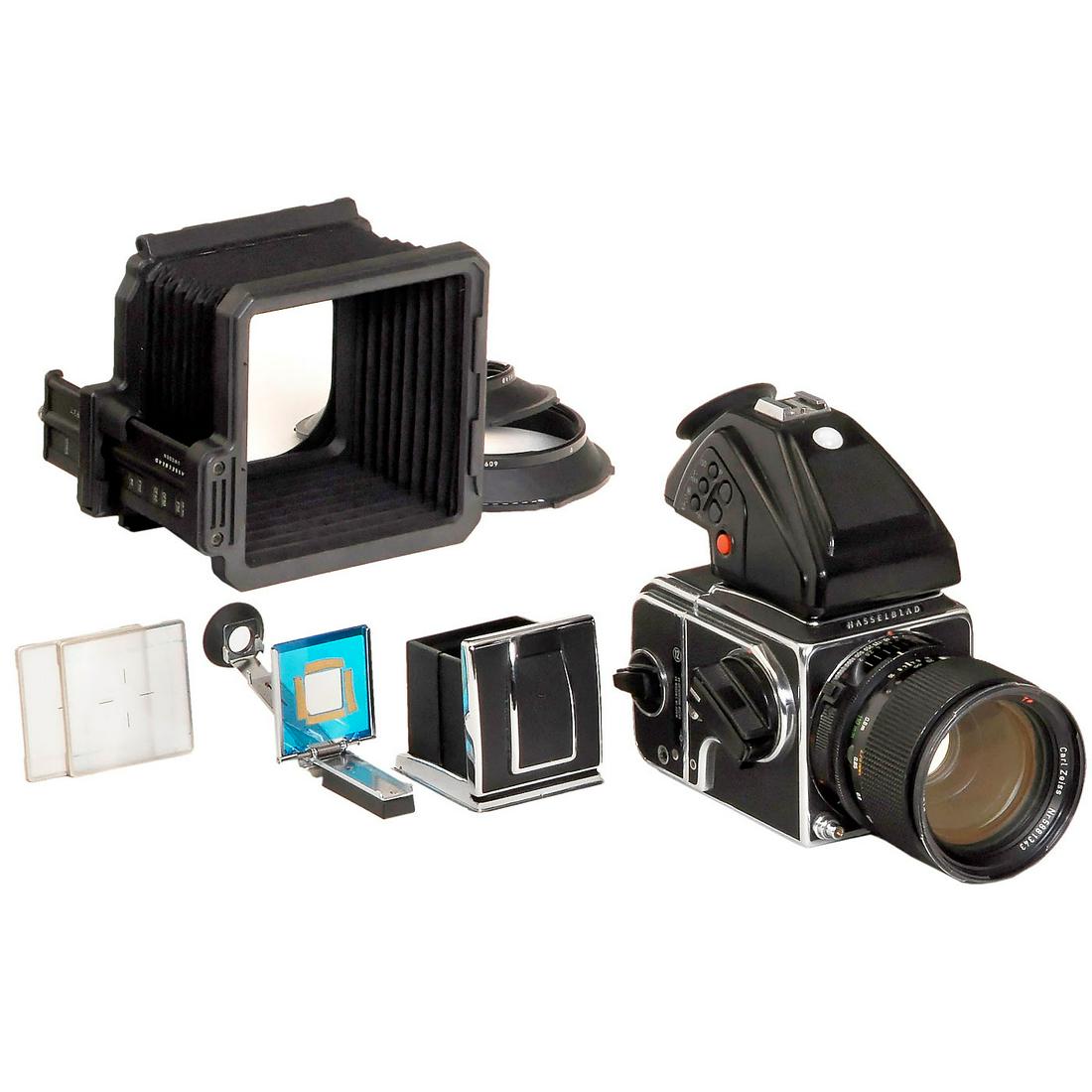 Hasselblad 2000 FCW, 1988: Hasselblad 2000 FCW, 1988 Hasselblad, Sweden. 1) Hasselblad 2000 FCW, No. RR 1524639, shutter 1-1/2000 sec., working. - 2) Magazine A12, No. 30EH35436. - 3) Waist-level viewfinder. - 4) Prism viewfind