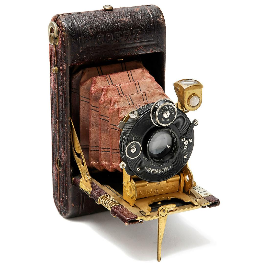 Goerz Tenax (Pocket Tenax), c. 1921: Goerz Tenax (Pocket Tenax), c. 1921 Goerz, Berlin. Rollfilm camera, size 4,5 x 6 cm, no. 245636, dark-red leather covering, red bellows, Dogmar 4,5/7,5 cm in Compur. Goerz Tenax (Taschen-Tenax), um 19