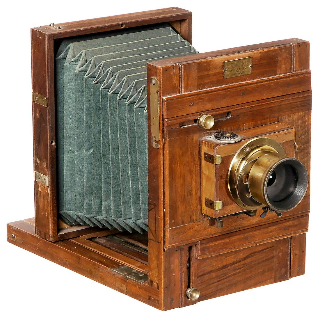 French Field Camera 13 x 18 cm by A. Tardy, c. 1890: French Field Camera 13 x 18 cm by A. Tardy, c. 1890 A. Tardy, 21. Rue Déstrée, Angle rue du Griffon, Lyon. Dark polished wood with brass fittings, green bellows, rotating focusing screen back, rolle